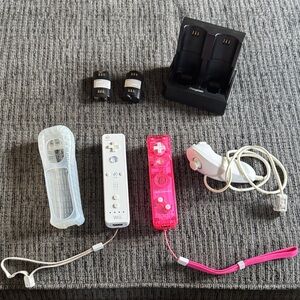 Nintendo Wii Console with Pink and White Controllers